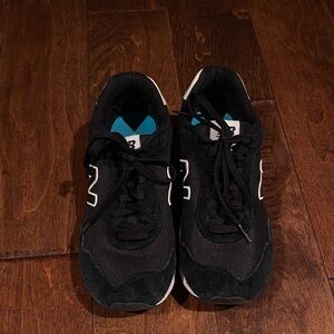 Black Sneakers with White Accents